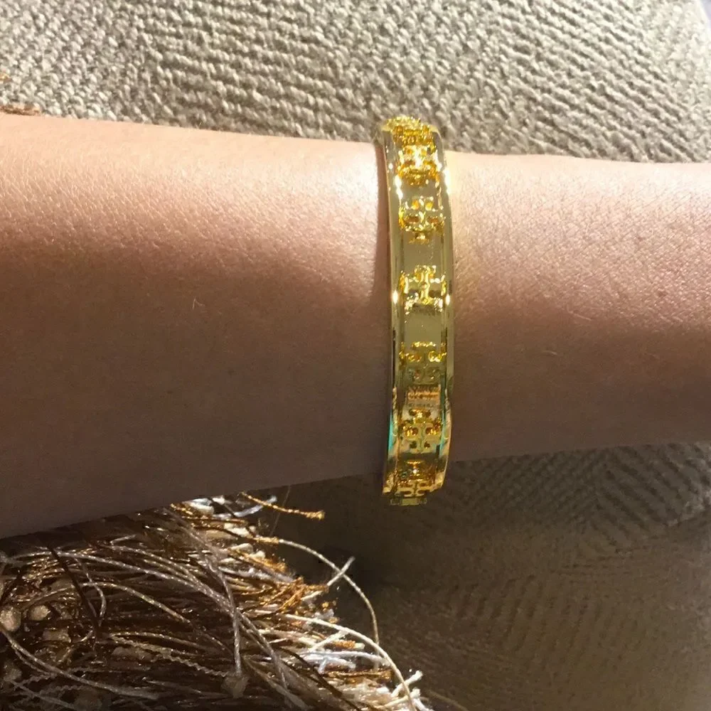 TORY BURCH RAISE LOGO STUDDED 18k GOLD PLATED BRACELET